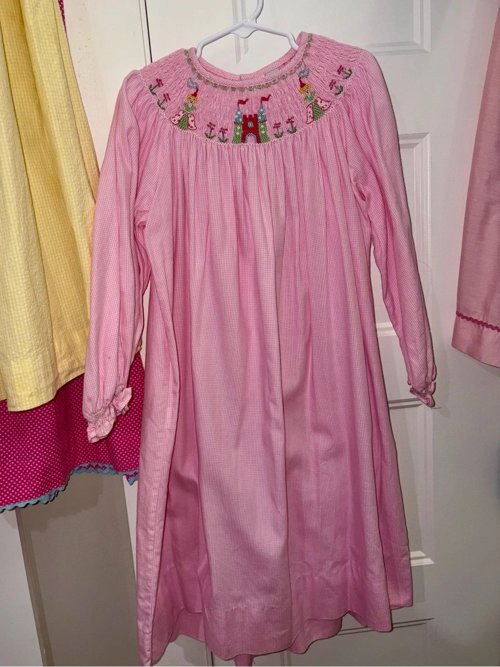 Classic Girls' Pink Smocked Long-Sleeve Dress with Princess Design